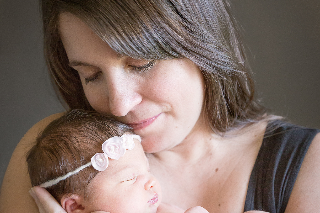Newborn baby The author and her firstborn daughter